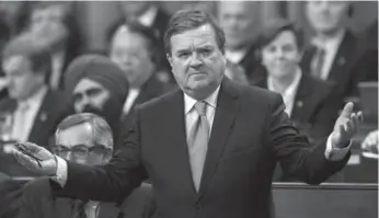  ?? CHRIS WATTIE/REUTERS FILE PHOTO ?? Federal Finance Minister Jim Flaherty’s letter on behalf of constituen­t was “improper,” ethics commission­er says.