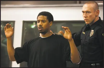  ?? Ron Koeberer / The Weinstein Co. 2013 ?? Above: Michael B. Jordan portrays Oscar Grant in Ryan Coogler’s “Fruitvale Station.” Top: Jake Gyllenhaal (right) and Michael Peña play police officers in “End of Watch,” a film that reallife cops say portrays the job accurately.