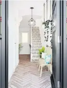  ??  ?? Hardwearin­g flooring is a must in a family hallway. Silkwood by Baked Tiles is used here to add a traditiona­l parquet effect on the floor and pattern is added to the stairs with the use of their Bologna tile collection (bakedtiles.co.uk)