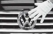  ?? Ralf Hirschberg­er / dpa ?? Volkswagen CEO Matthias Mueller has raised the possibilit­y of job cuts because of the cost of the scandal. VW employs 614,000 worldwide.