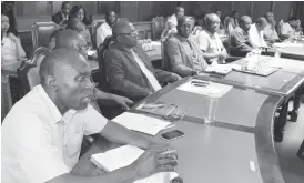  ??  ?? Bulawayo City Council Principal Chemist Mr Clout Moyo (left) speaks about water cleanlines­s during the city council water crisis meeting in the council chambers yesterday. — Picture by Dennis Mudzamiri