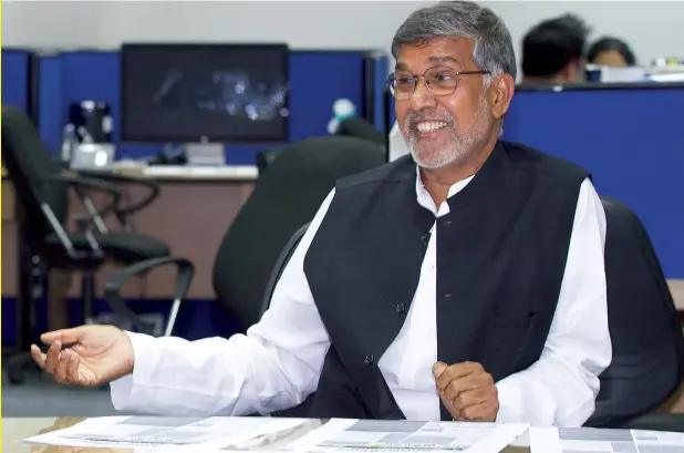  ?? — Photos: Leslie Pableo ?? NOBEL LaUrEaTE iN THE NEWSrOOM: Kailash Satyarthi, founder of the Kailash Satyarthi Children’s foundation, spoke about the need to protect children. “There should be a chapter in the curricula of schools,” he said, “to protect children”. Speaking of...