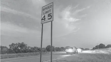  ?? NICK OXFORD/THE NEW YORK TIMES ?? A police officer pulls over a motorist July 8 in Savanna, Oklahoma.