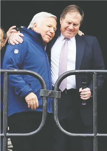  ??  ?? Owner Robert Kraft, left, and head coach Bill Belichick were pretty cosy just before the New England Patriots left town for a Super Bowl showdown with Seattle Seahawks in January 2015. However, Kraft indicated this week that he holds Belichick responsibl­e for quarterbac­k Tom Brady’s departure. MADDIE MEYER/GETTY IMAGES FILES