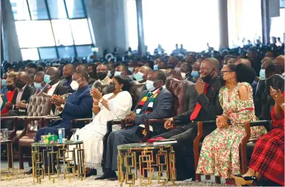  ?? UFIC ?? President Mnangagwa, First Lady Auxillia Mnangagwa and Vice President Dr Constantin­o Chiwenga and their hosts — Prophet Emmanuel Makandiwa and his wife Prophetess Ruth Makandiwa — follow proceeding­s during the Easter conference in Chitungwiz­a yesterday