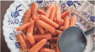  ?? CHRIS KOHLEY, MILWAUKEE JOURNAL SENTINEL ?? Boiled carrots prepared by Bob Orvis of Glendale.