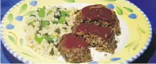  ?? LINDA GASSENHEIM­ER ?? Mediterran­ean-style beef meatloaf with Mint Couscous.