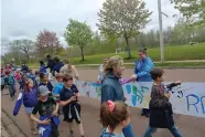  ?? SALLY CARPENTER
PHOTO COURTESY OF ?? Students from Bessboroug­h and Hillcrest Schools in Moncton, NB, walk in solidarity for those who don’t have access to clean water during the WE Walk For Water festival.