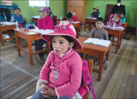  ?? (AP/Martin Mejia) ?? Students attend Quechua Indigenous language class Sept. 1 at a public primary school in Licapa, Peru.