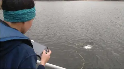  ?? (Special to The Commercial/University of Arkansas at Pine Bluff) ?? Jamie Kindschuh pilots a submersibl­e drone at DeGray Lake.