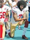  ?? AL DIAZ, MIAMI HERALD VIA AP ?? Colin Kaepernick takes a knee during 2016 NFL game in Miami.