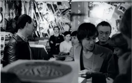  ?? PICTURE / CHRIS SLANE/AUDIOCULTU­RE ?? Iggy Pop (foreground) at Taste Records in 1979 with writer David Herkt on Iggy’s left, looking at future record-label entreprene­ur and producer, Simon Grigg (far left). Looking over Iggy’s shoulder on the right is future Oscar-winner Kim Sinclair (Best Art Direction, Avatar).