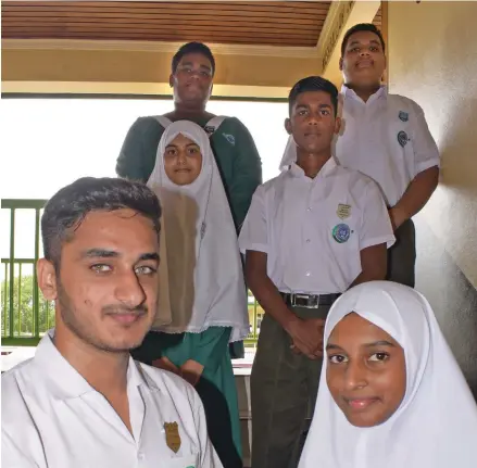  ?? Photo: Ronald Kumar ?? Nasinu Muslim College 2019 prefects. Front from left; head boy Haider Khan Niazi and head girl Naeema Sharif. Middle from left; deputy head girl Siddiqa Ali and deputy head boy Mohammed Altaf. Back from left; assistant head girl Kelera Biti and assistant head boy Titus Moheed after their prefect induction on February 6, 2019.