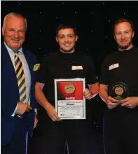  ??  ?? Left: PCs Paul Mallon and Iain Mackintosh accept the Uniform Services Award from Bailie Russell Robertson