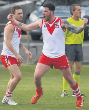  ??  ?? REASON TO CELEBRATE: Ararat forward Lachie Hamilton pumps the air and celebrates one of his five goals. Picture: PAUL CARRACHER