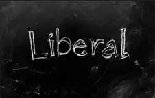  ?? Dreamstime ?? “Liberal” is handwritte­n on a blackboard.