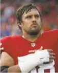  ?? Michael Zagaris / Getty Images 2018 ?? Weston Richburg, who signed a fiveyear contract in 2018, last played in December 2019.