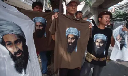  ??  ?? Osama bin Laden T-shirts on sale in Bangkok, Thailand, reinforce his image as the Muslim Che Guevara. Photograph: Yvan Cohen/ LightRocke­t via Getty Images