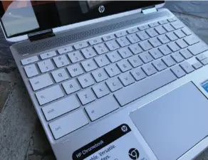  ??  ?? The HP Chromebook x360 12b offers a surprising­ly comfortabl­e keyboard for the price, and a very large trackpad.