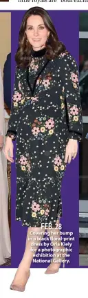  ??  ?? FEB. 28 Covering her bump in a black floral-print dress by Orla Kiely for a photograph­ic exhibition at the National Gallery.