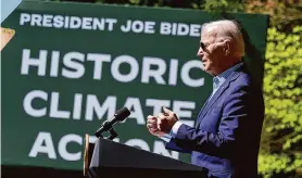  ?? Manuel Balce Ceneta/Associated Press ?? President Joe Biden announces federal grants for residentia­l solar projects on Monday, Earth Day, at Prince William Forest Park in Triangle, Va.