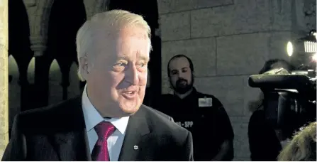  ?? FRED CHARTRAND/THE CANADIAN PRESS ?? Former prime minister Brian Mulroney leaves a Liberal cabinet meeting Thursday in Ottawa.