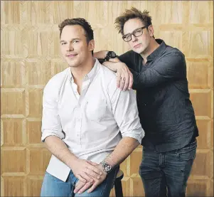  ?? AP PHOTO ?? In this April 20 photo, Chris Pratt, left, a cast member in “Guardians of the Galaxy Vol. 2,” and the film’s writer/ director James Gunn pose together at the London West Hollywood Hotel in West Hollywood, Calif. The film opens May 5.