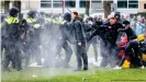  ??  ?? Police, aid workers and journalist­s were deliberate­ly attacked in latest curfew protests according to the Dutch Justice Minister