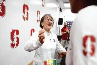  ?? Scott Strazzante/The Chronicle ?? Stanford women’s basketball coach Tara VanDerveer greets player Kiki Iriafen after VanDerveer announced her retirement Wednesday at a news conference.