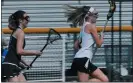  ?? COURTESY OF ABBIE RANDOW ?? West Windsor South senior Abbie Randow, right, not only excels on the lacrosse field, but is also voicing the need for change in her community.