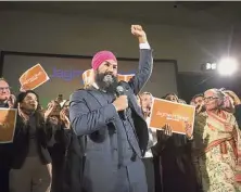  ??  ?? People’s
choice: Jagmeet celebratin­g with supporters after his first-ballot triumph in Toronto. — AP