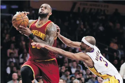  ?? JAE C. HONG/THE ASSOCIATED PRESS ?? By giving LeBron James some extra nights off, the Cleveland Cavaliers are trying to lengthen their star’s career.