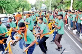  ??  ?? MCEME cadets dance while taking the Ganesh idol for immersion from Trimulgher­ry to Shameerpet Lake on Tuesday. The cadets had installed the idol at the Guruvayura­ppan Mandir in the cantonment in connection with Ganesh celebratio­ns.