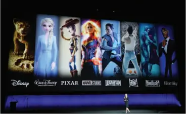  ?? — AFP photo ?? President of Walt Disney Distributi­on Franchise Management, Business & Audience Insights, Cathleen Taff, speaks in front of the studios part of Walt Disney Studio during a special presentati­on at the Colosseum Caesars Palace in Las Vegas, Nevada.