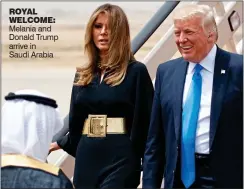  ??  ?? ROYAL WELCOME: Melania and Donald Trump arrive in Saudi Arabia