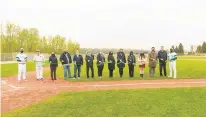  ?? MVCC ?? School and team officials cut the ribbon at Moraine Valley Community College’s refurbishe­d baseball field recently.