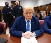  ?? MICHAEL M. SANTIAGO GETTY IMAGES ?? Donald Trump slammed the prosecutio­n as he left the courthouse Friday after spending most of the week in his role as criminal defendant instead of political candidate.