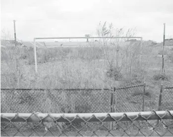  ?? AMY BETH BENNETT/SUN SENTINEL ?? Lockhart Stadium, the former home of the Strikers soccer team, sits unused, overgrown with weeds and brush.