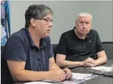  ?? JESSICA NYZNIK EXAMINER ?? Laurie Hatton, CUPE Local 1943 president, and Michael Hurley, Ontario Council of Hospital Unions president, talk to reporterso­n Friday.