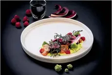  ??  ?? ABOVE
The venison with Romanesco broccoli, persimmon mustard, raspberry and mushroom consommé.