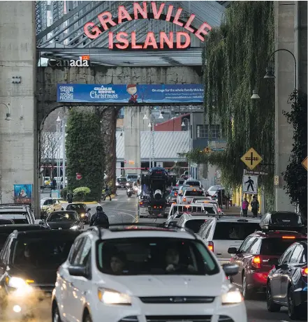  ?? RICHARD LAM/PNG ?? Roads and parking take up one-quarter of Granville Island’s area, architect Darryl Condon says. Making some areas car-free would allow for more pop-up stalls, festivals and public art.
