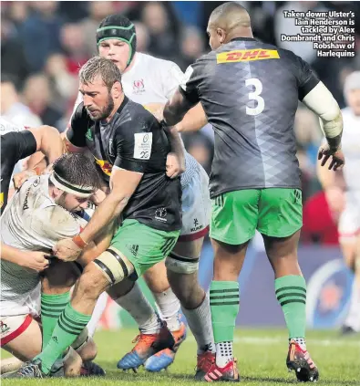  ??  ?? Taken down: Ulster’s Iain Henderson is
tackled by Alex Dombrandt and Chris Robshaw of Harlequins