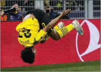  ?? MARTIN MEISSNER — THE ASSOCIATED PRESS ?? Dortmund’s Karim Adeyemi celebrates after scoring his side’s first goal during the Champions League round of 16, first leg match against Borussia Dortmund in Dortmund, Germany on Wednesday.