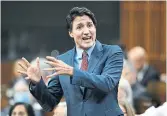  ?? J USTIN TANG THE CANADIAN PRESS ?? Prime Minister Justin Trudeau said Wednesday “we understand that there are concerns by hunters … and farmers that we’re going after their shotguns and rifles. We are not.”