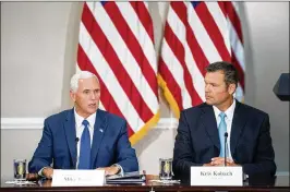  ?? ANDREW HARNIK / AP ?? Vice President Mike Pence (left) speaks during the first meeting of the Presidenti­al Advisory Commission on Election Integrity on July 19 in Washington, accompanie­d by commission vice chairman Kansas Secretary of State Kris Kobach.