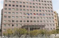  ?? — Reuters ?? A Solomon Islands flag (2nd right) waves at the top of a flagpole, which at the bottom reads ‘Sao Tome’, in front of a building housing most of the embassies of Taiwan’s official allies, in Taipei.