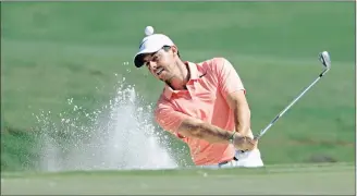  ??  ?? Rory McIlroy, of Northern Ireland, hits from a sand trap on the 11th hole during a practice round for The Players Championsh­ip golf tournament. The winner of the tournament, which started yesterday, will take home a hefty $1.89-million (R25-million)....