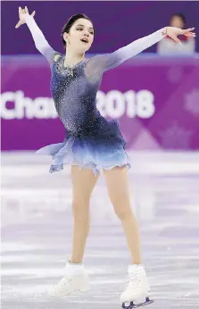  ?? DAVID J. PHILLIP/THE ASSOCIATED PRESS ?? Teenagers Evgenia Medvedeva, above, and Alina Zagitova of the Olympic Athletes from Russia helped set the tone at the women’s short program at the 2018 Winter Olympics.