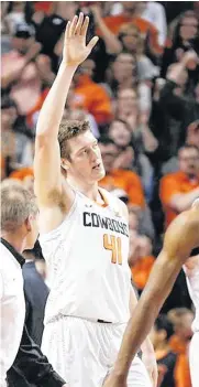  ?? [PHOTO BY NATE BILLINGS, THE OKLAHOMAN] ?? Oklahoma State’s Mitchell Solomon waves as he leaves the floor after fouling out Monday in a 71-65 win over Stanford in the second round of the NIT at Gallagher-Iba Arena.
