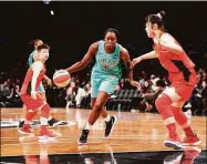  ?? Mike Lawrence / New York Liberty ?? The New York Liberty’s Tina Charles drives down the lane against the Chinese national team in a preseason game in 2019. Former UConn great Charles will make her debut with the Phoenix Mercury this season.